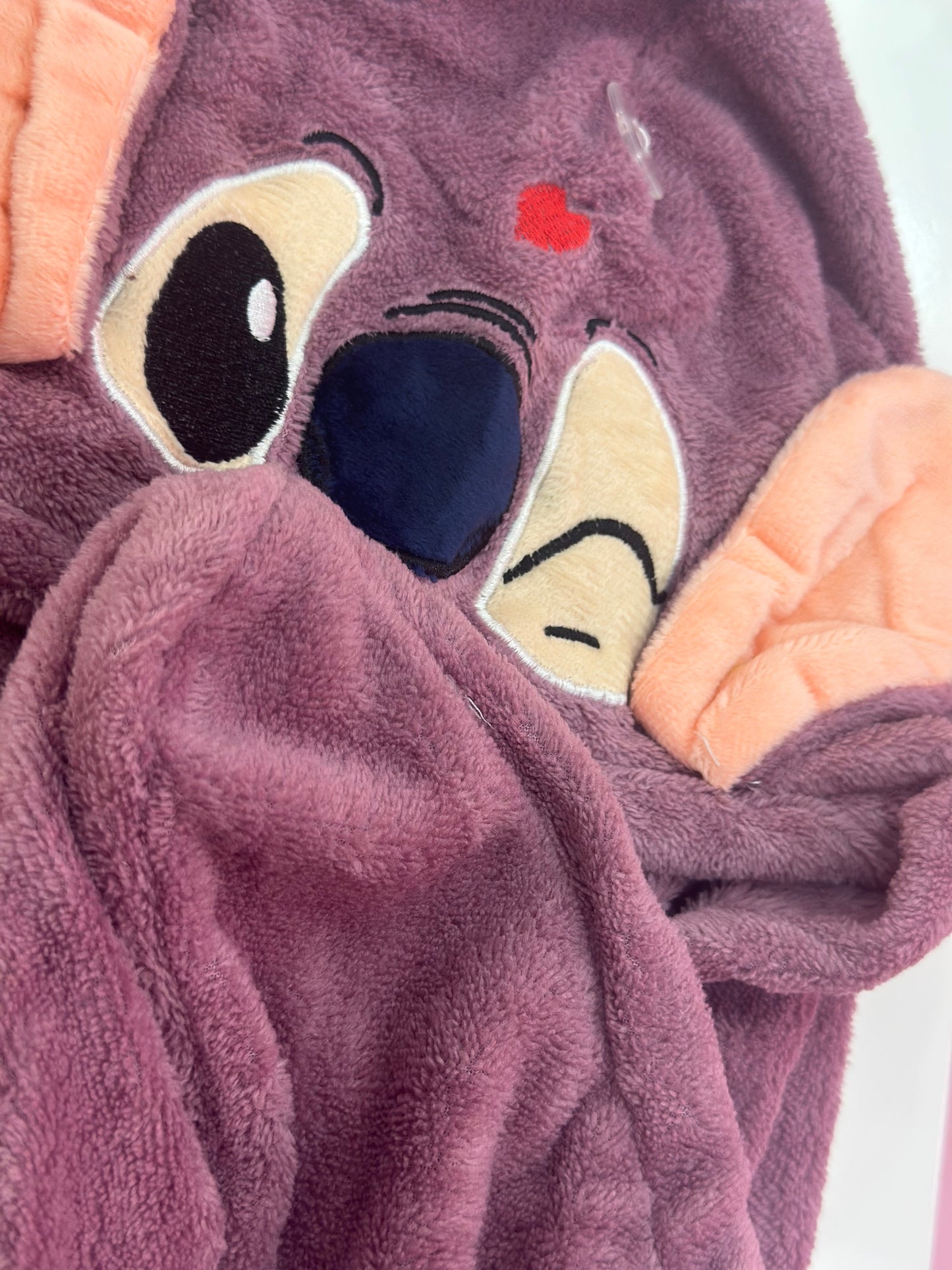 Stitch twist microfiber towel