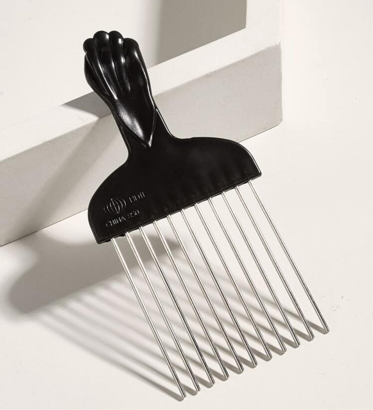 Metal hair pick