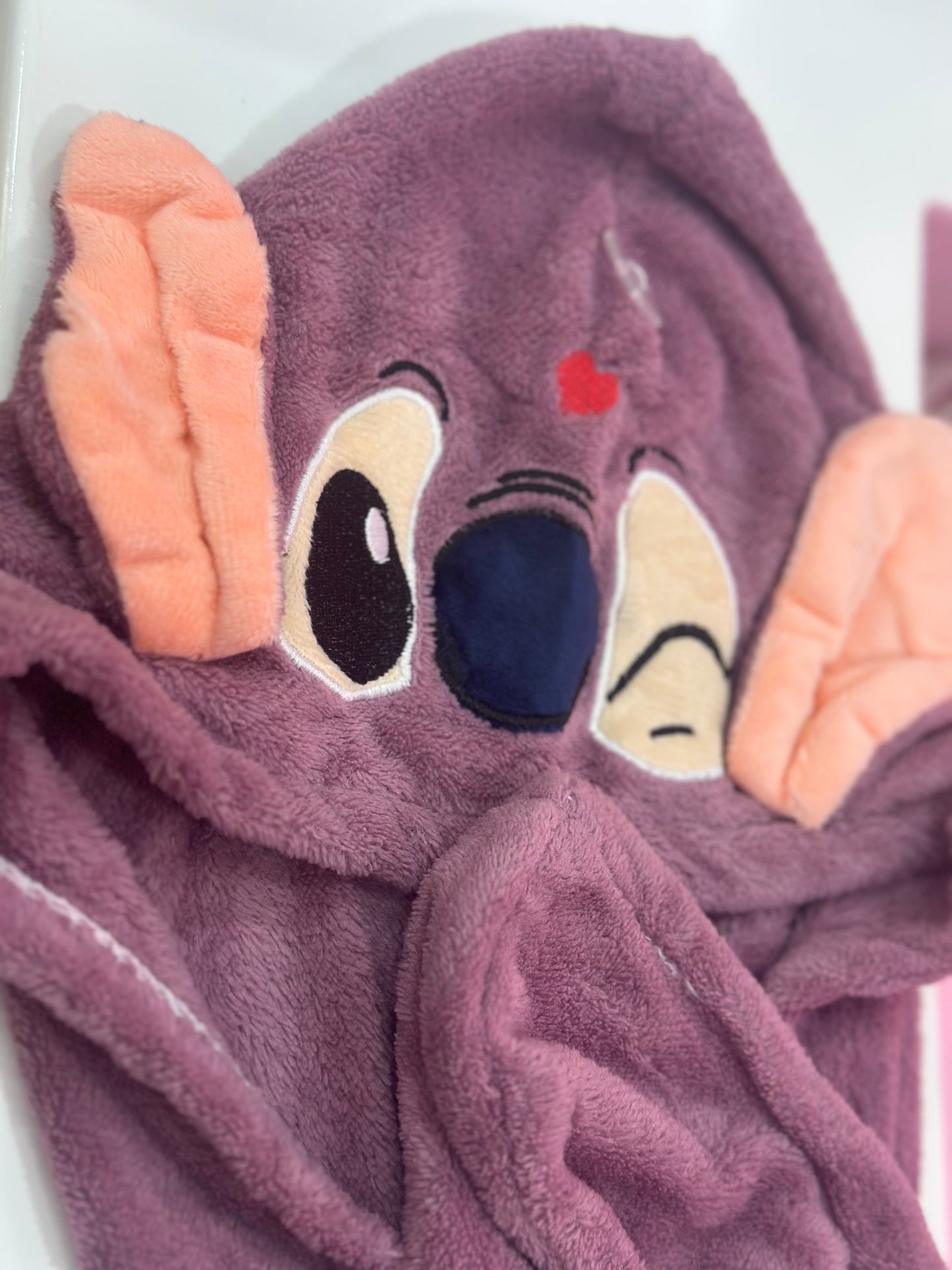 Stitch twist microfiber towel
